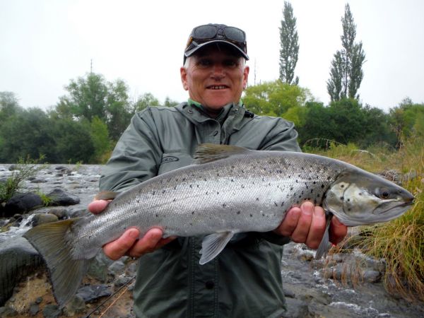 Nige with his first brown from the river.