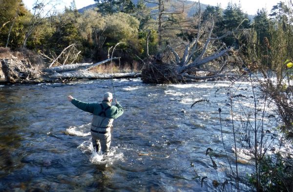 Mike dancing downriver but fish number five didn't want to come in.