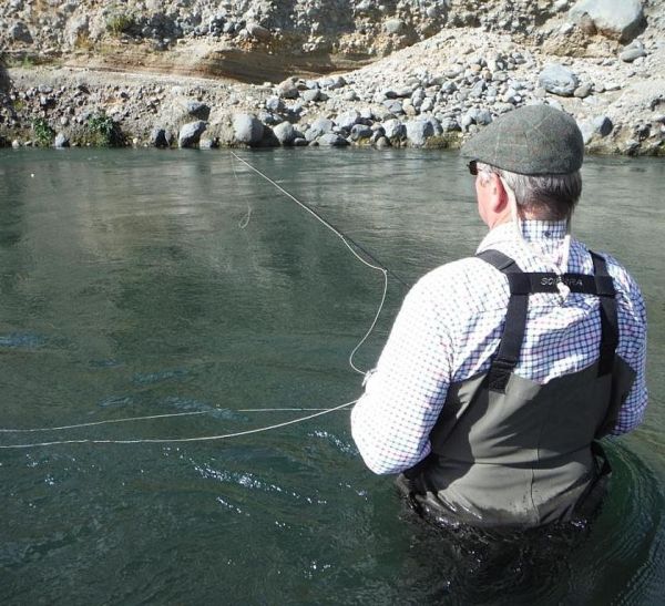 I like to follow the flies downstream with the rod tip just in front of the indicator.