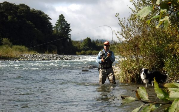 Sean about to lose a strong fish on the middle river.