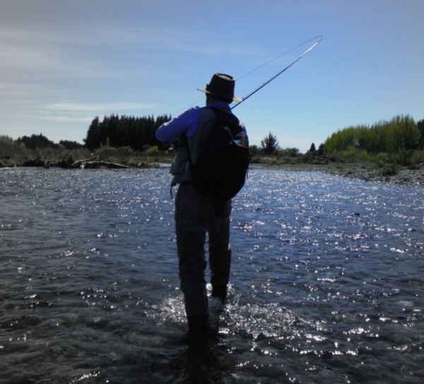 An angler chasing one downstream.
